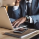 Image of a CEO using a laptop.