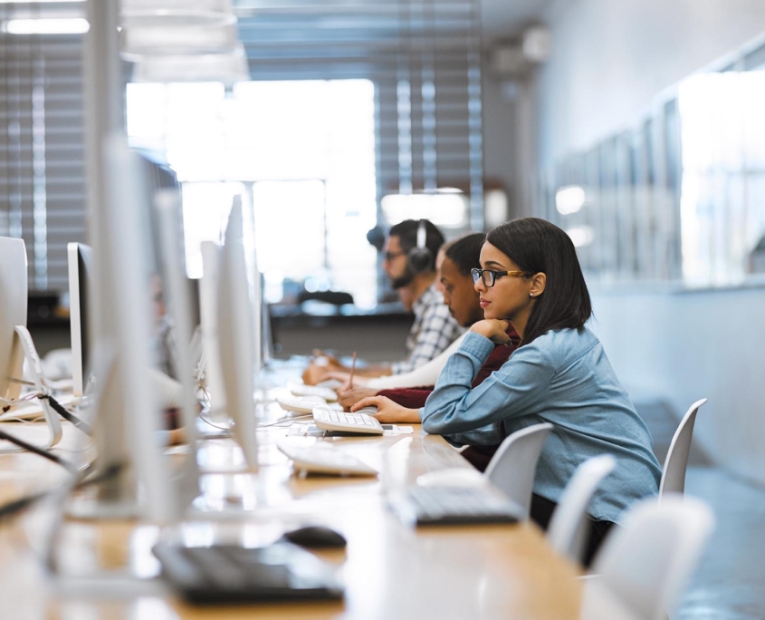 College students on computers in computer lab